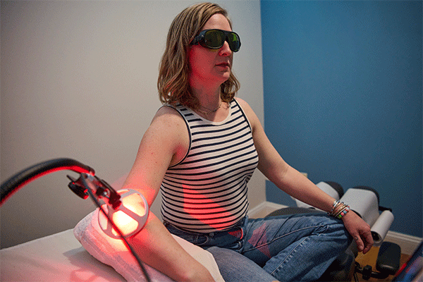 Woman receiving Cold Laser Therapy for elbow pain in Red Hook, NY